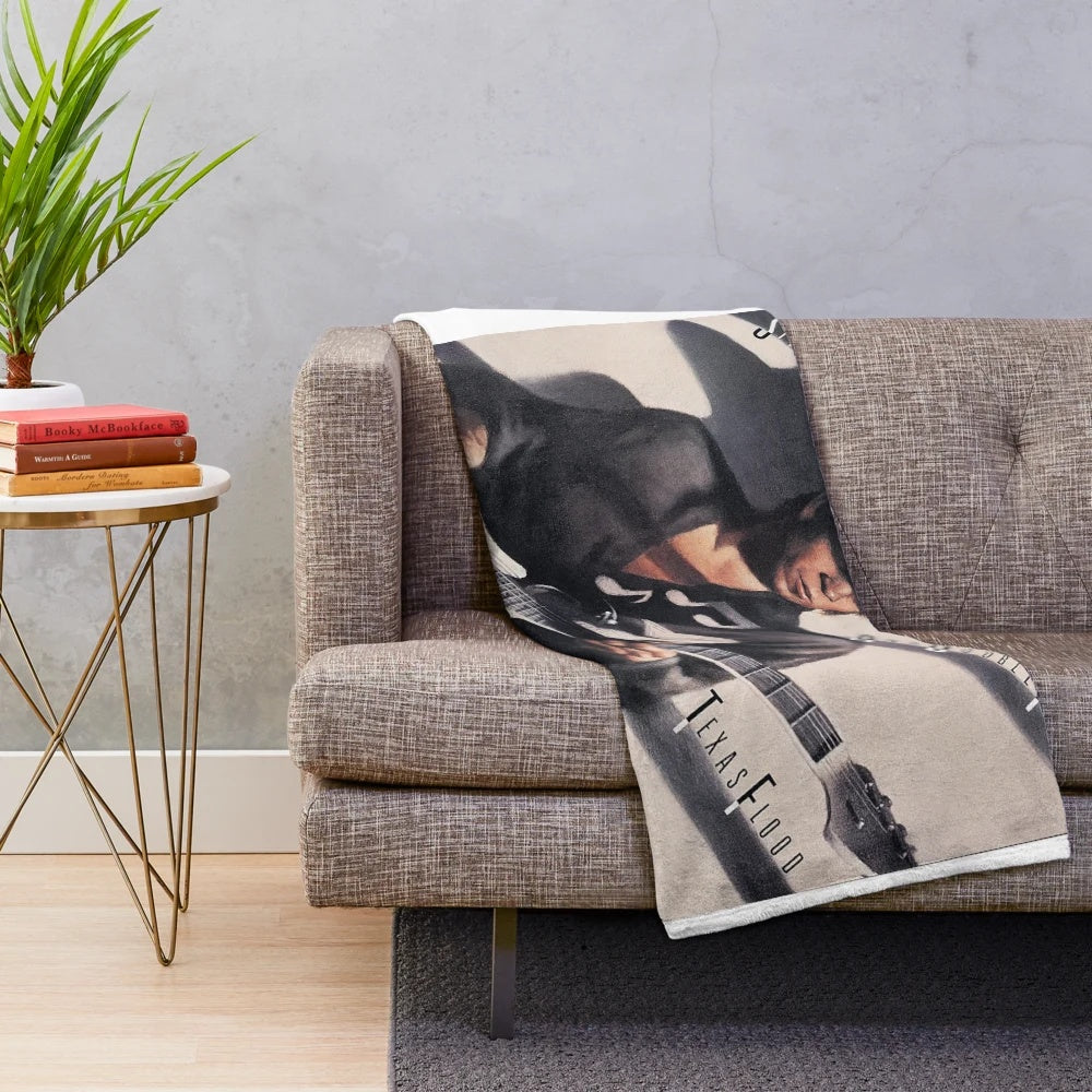 Plush blanket featuring the iconic "Texas Flood" album cover art of Stevie Ray Vaughan.