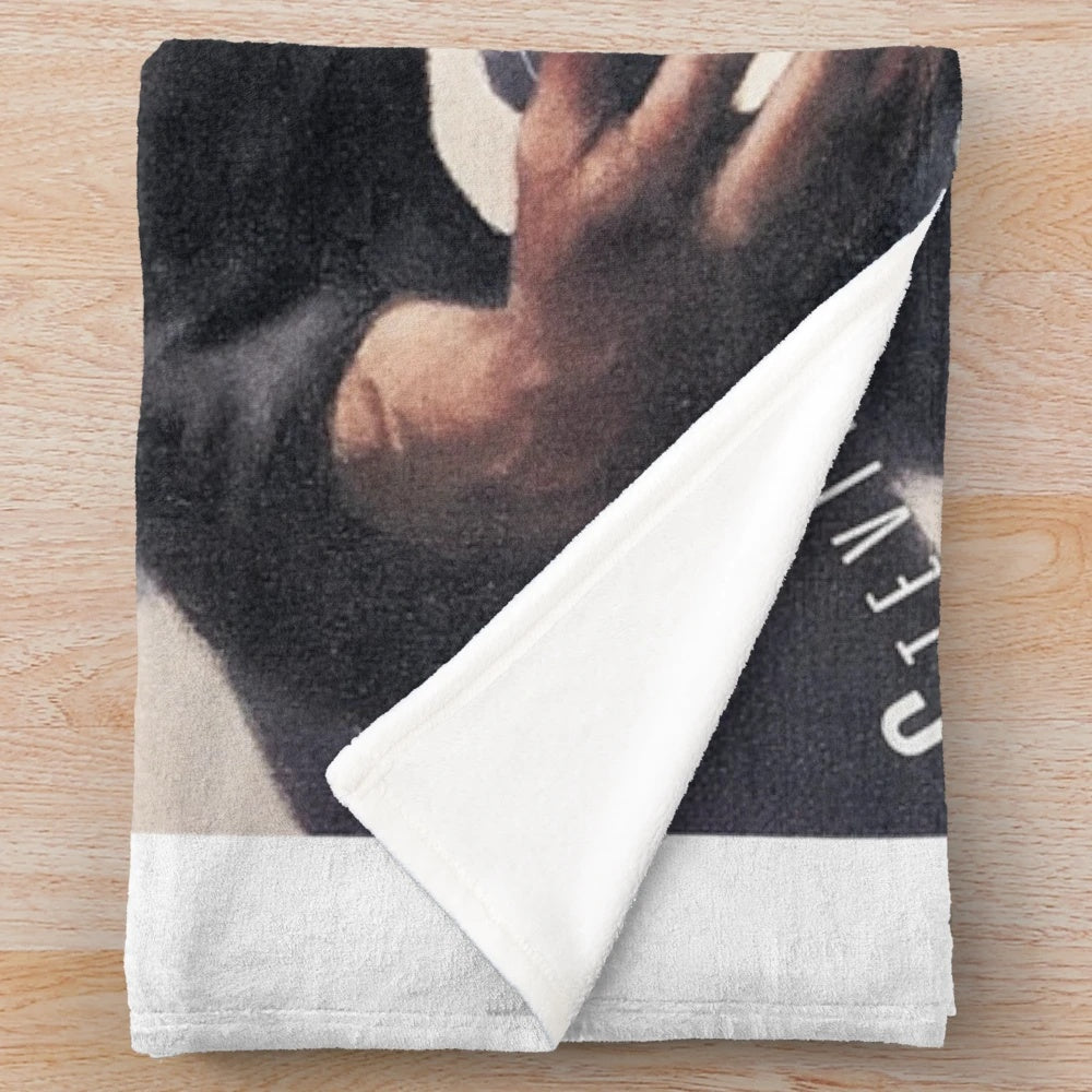 Plush blanket featuring the iconic "Texas Flood" album cover art of Stevie Ray Vaughan.