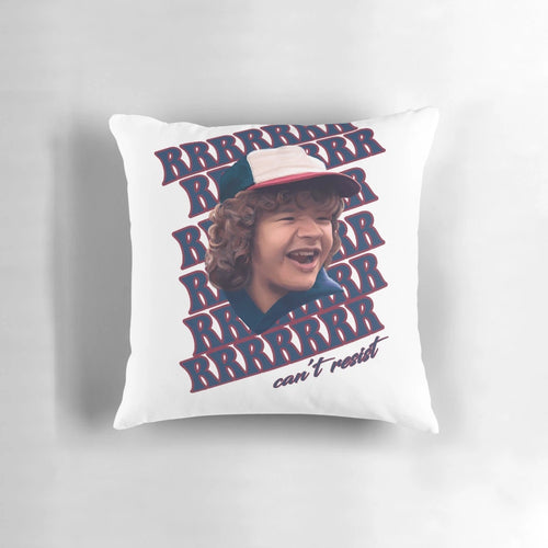 A cozy pillow featuring the character Dustin from the Netflix series Stranger Things, with the caption "Can't resist those pearls."