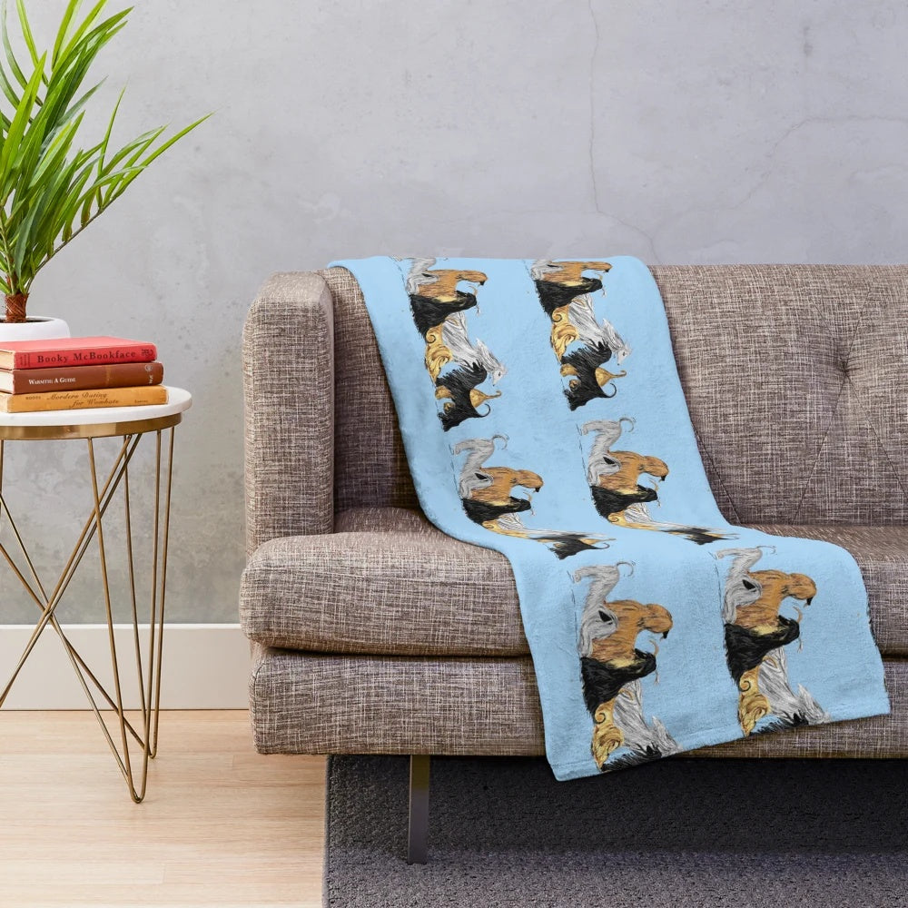 Illustration of an Afghan hound on a blue plush blanket