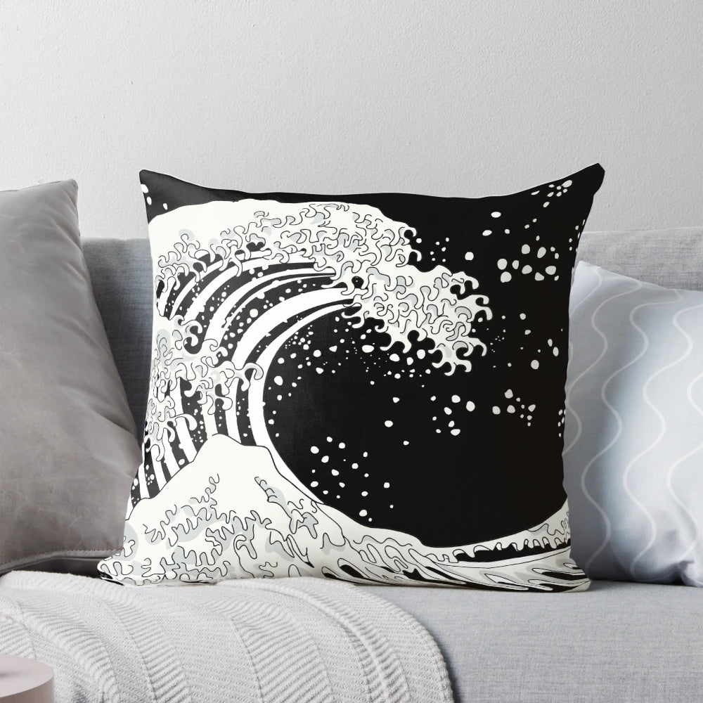 Black and white decorative pillow featuring a bold, graphic wave design
