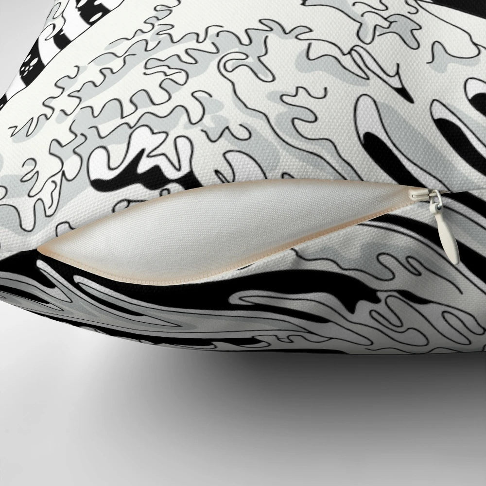 Black and white decorative pillow featuring a bold, graphic wave design