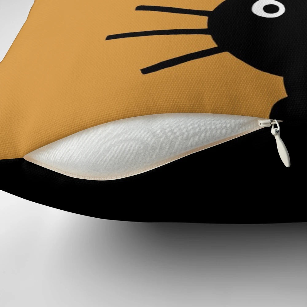 A decorative black cat-themed pillow with a fun, whimsical design.