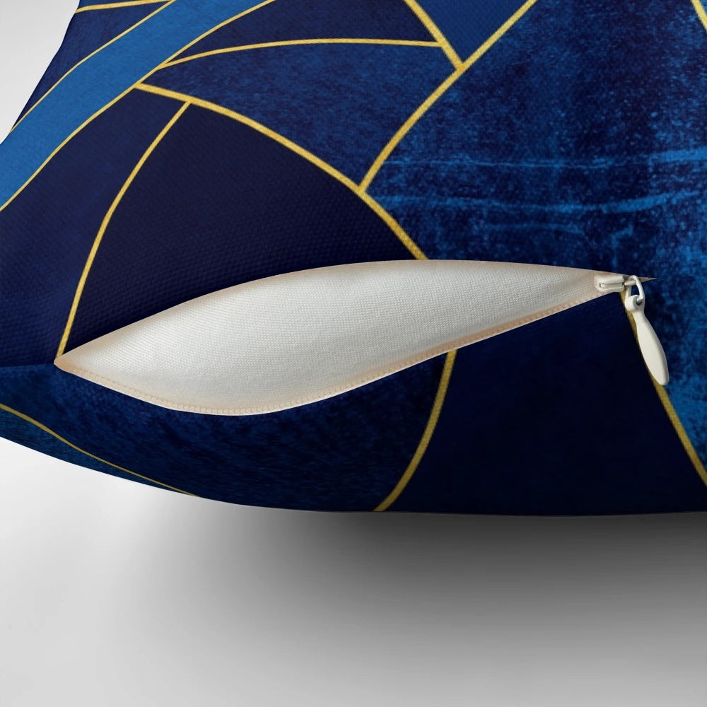 Blue and yellow geometric patterned pillow