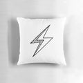 A striking black and white hand drawn lightning bolt design on a decorative throw pillow.