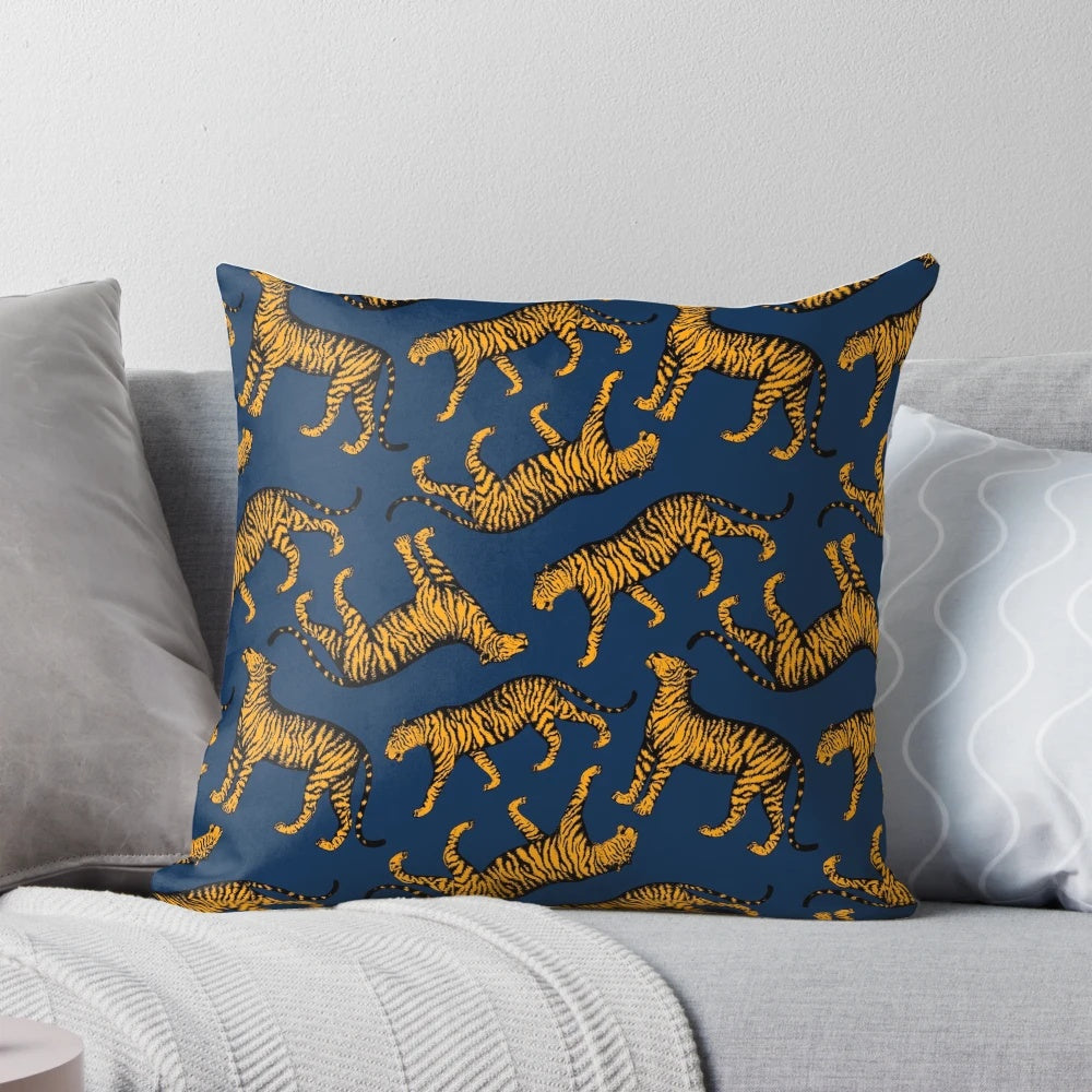 Decorative throw pillow featuring a striking design of tigers in navy blue and marigold colors