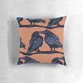Linocut print of two black and white crows against an orange background