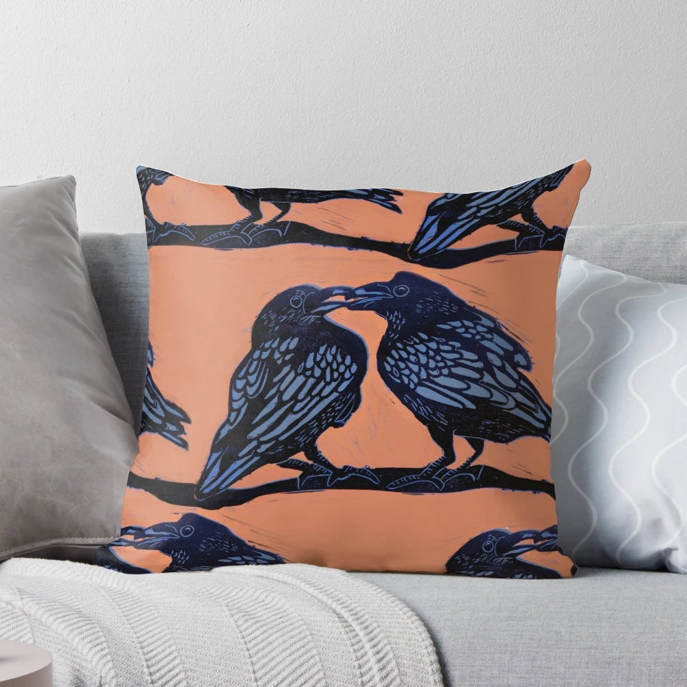 Linocut print of two black and white crows against an orange background