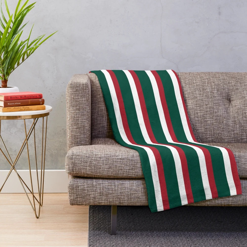 Striped plush blanket in a minimalist geometric design inspired by the Leicester Tigers rugby club colors