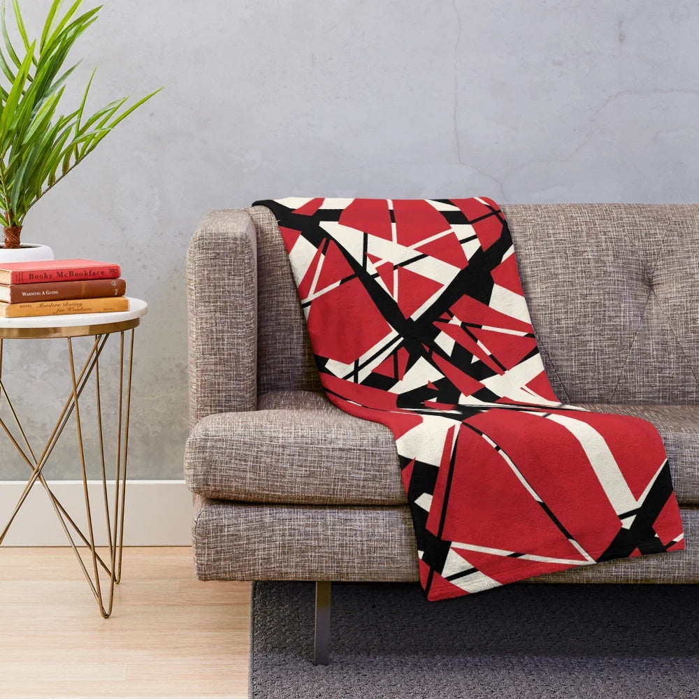 Red and white striped plush blanket inspired by the iconic design of Eddie Van Halen's guitar