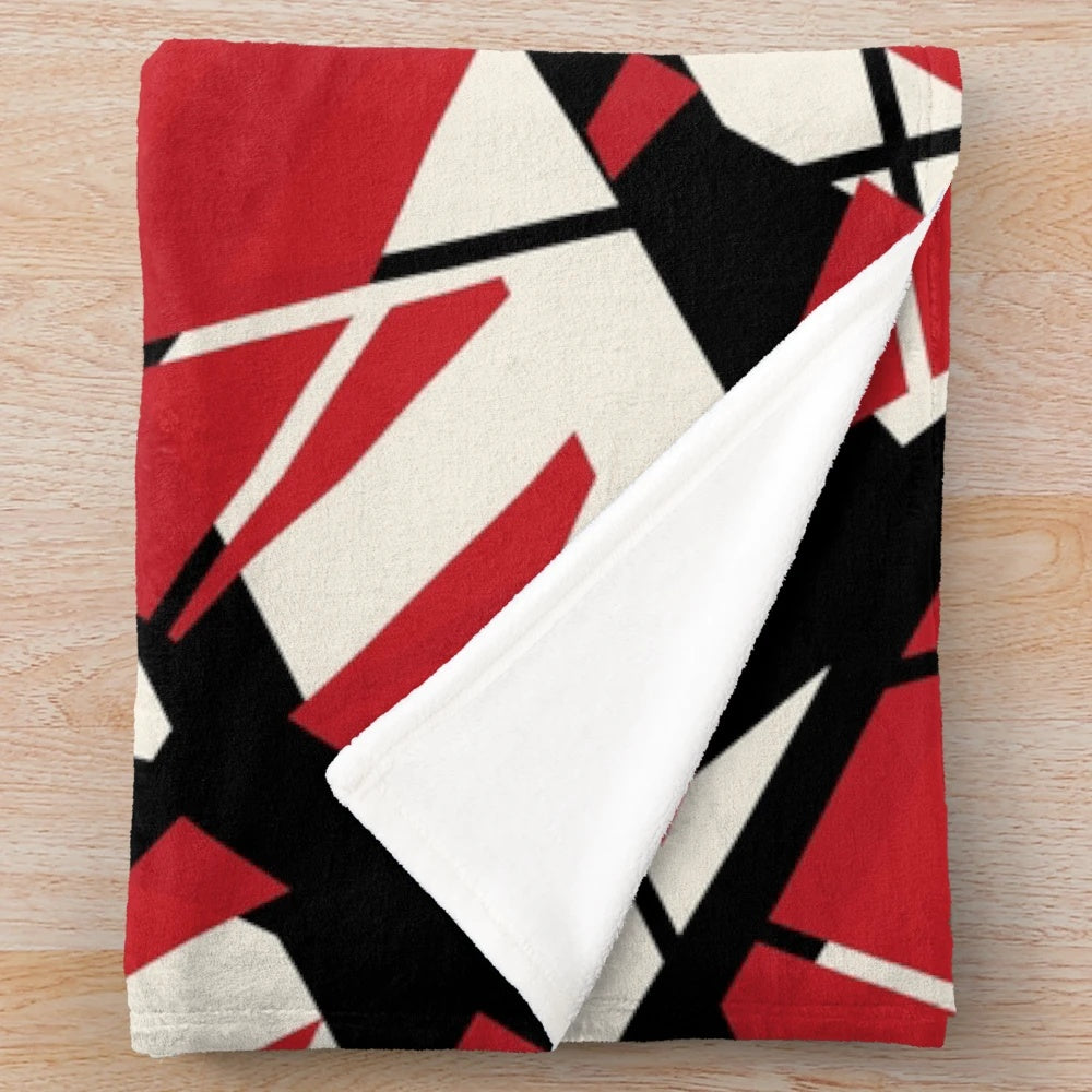 Red and white striped plush blanket inspired by the iconic design of Eddie Van Halen's guitar