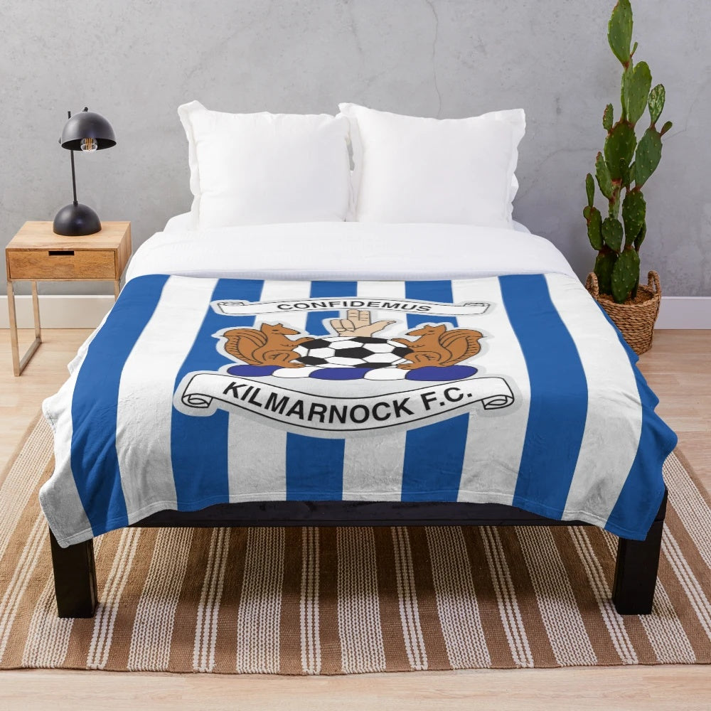 Striped plush blanket featuring the colors and design of Kilmarnock Football Club