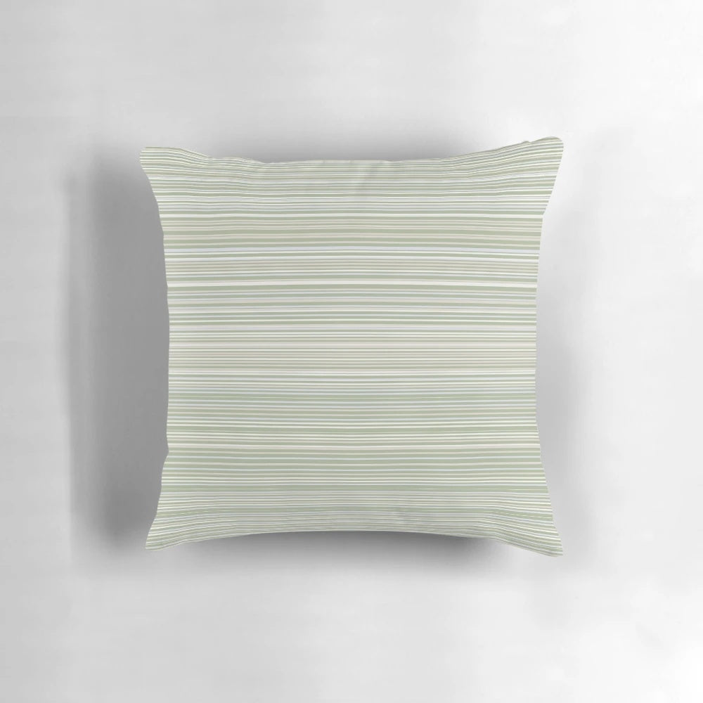 Soft, striped sage green pillow with a minimalist, neutral pattern design.
