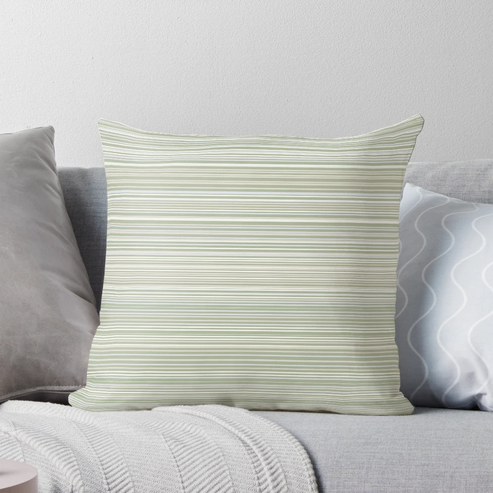 Soft, striped sage green pillow with a minimalist, neutral pattern design.