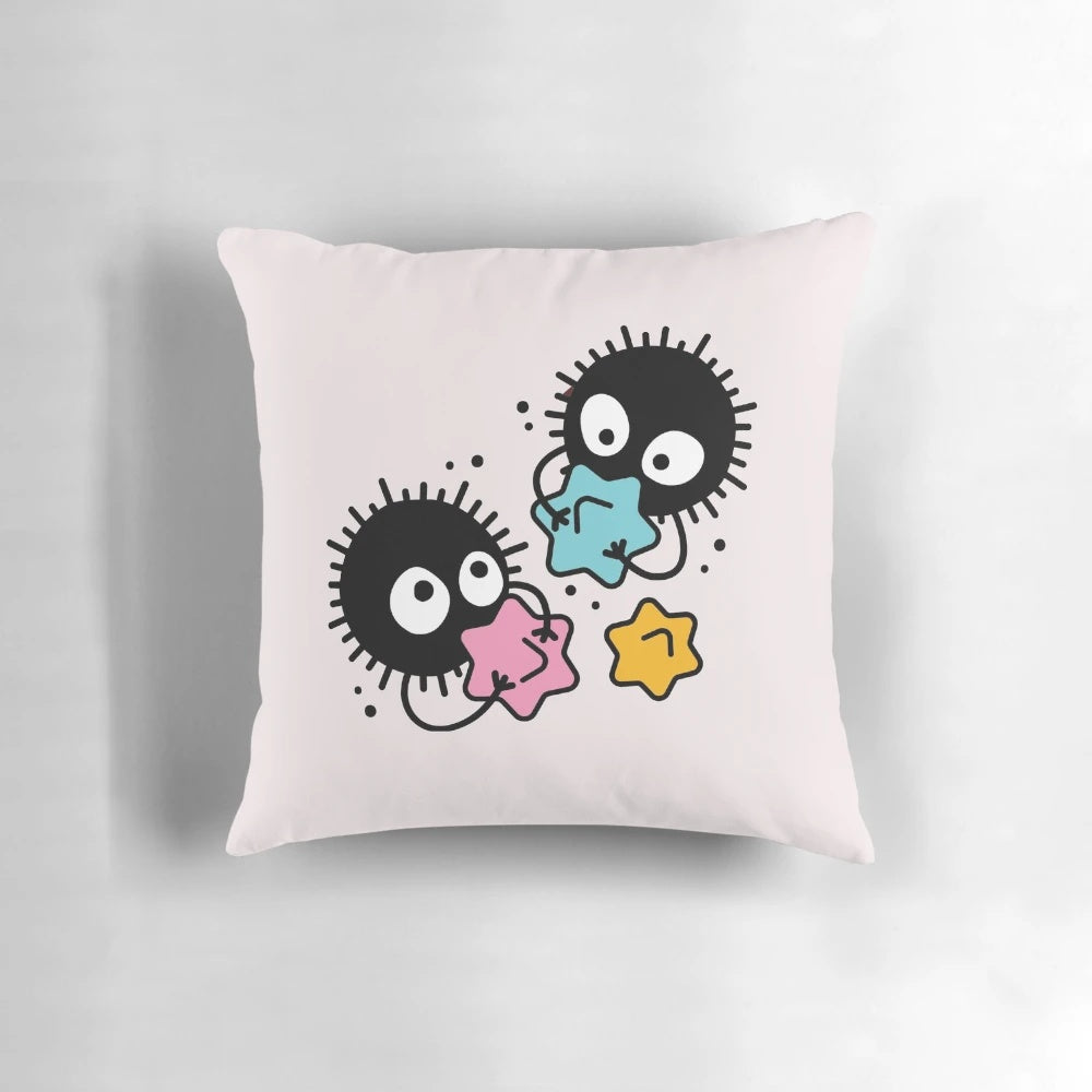 Studio Ghibli inspired pillow featuring soot sprites, Totoro, Ponyo, and characters from Howl's Moving Castle and Kiki's Delivery Service.