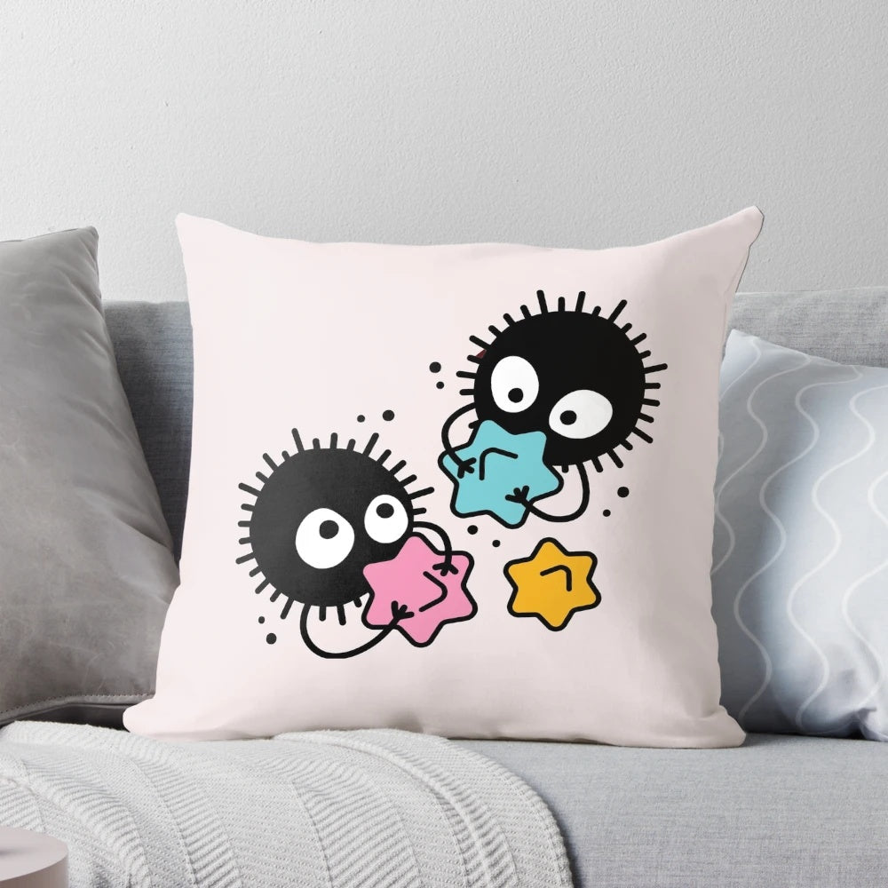 Studio Ghibli inspired pillow featuring soot sprites, Totoro, Ponyo, and characters from Howl's Moving Castle and Kiki's Delivery Service.
