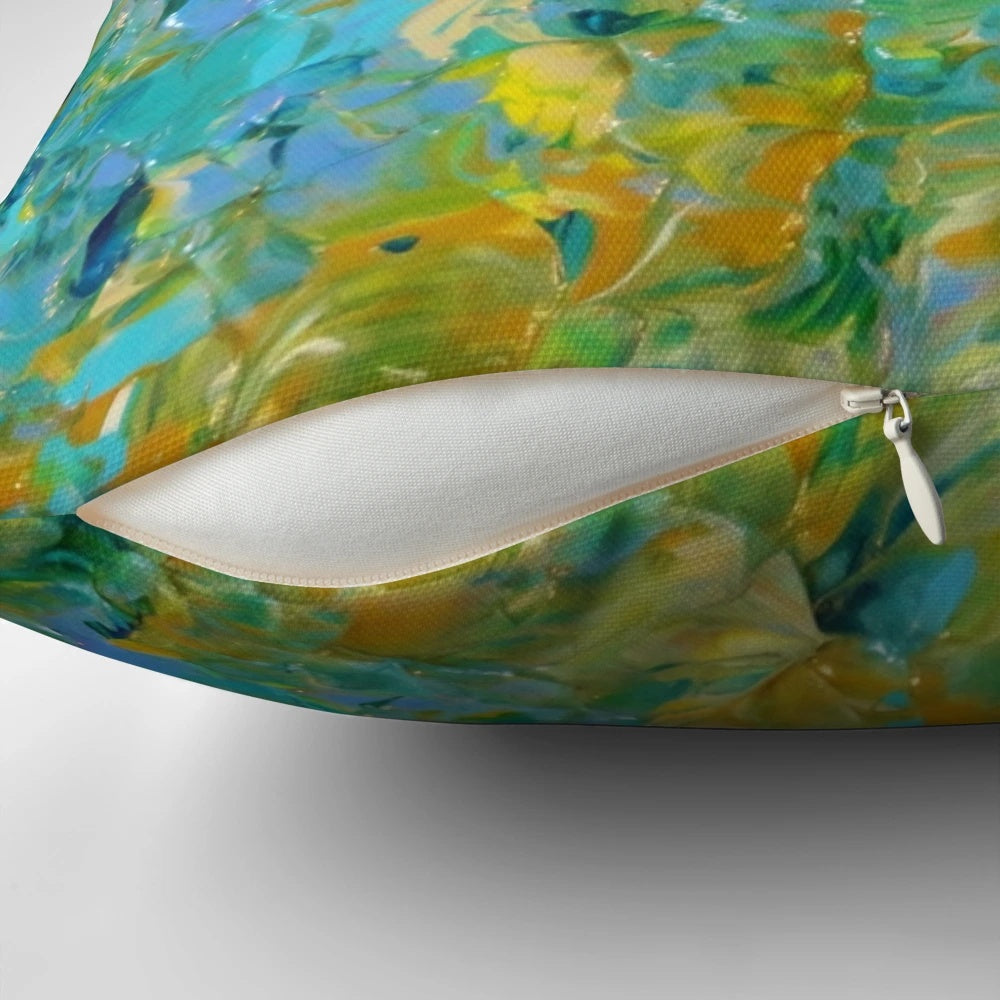 Vibrant abstract art pillow featuring a nature-inspired landscape of water, greenery, and bold colors