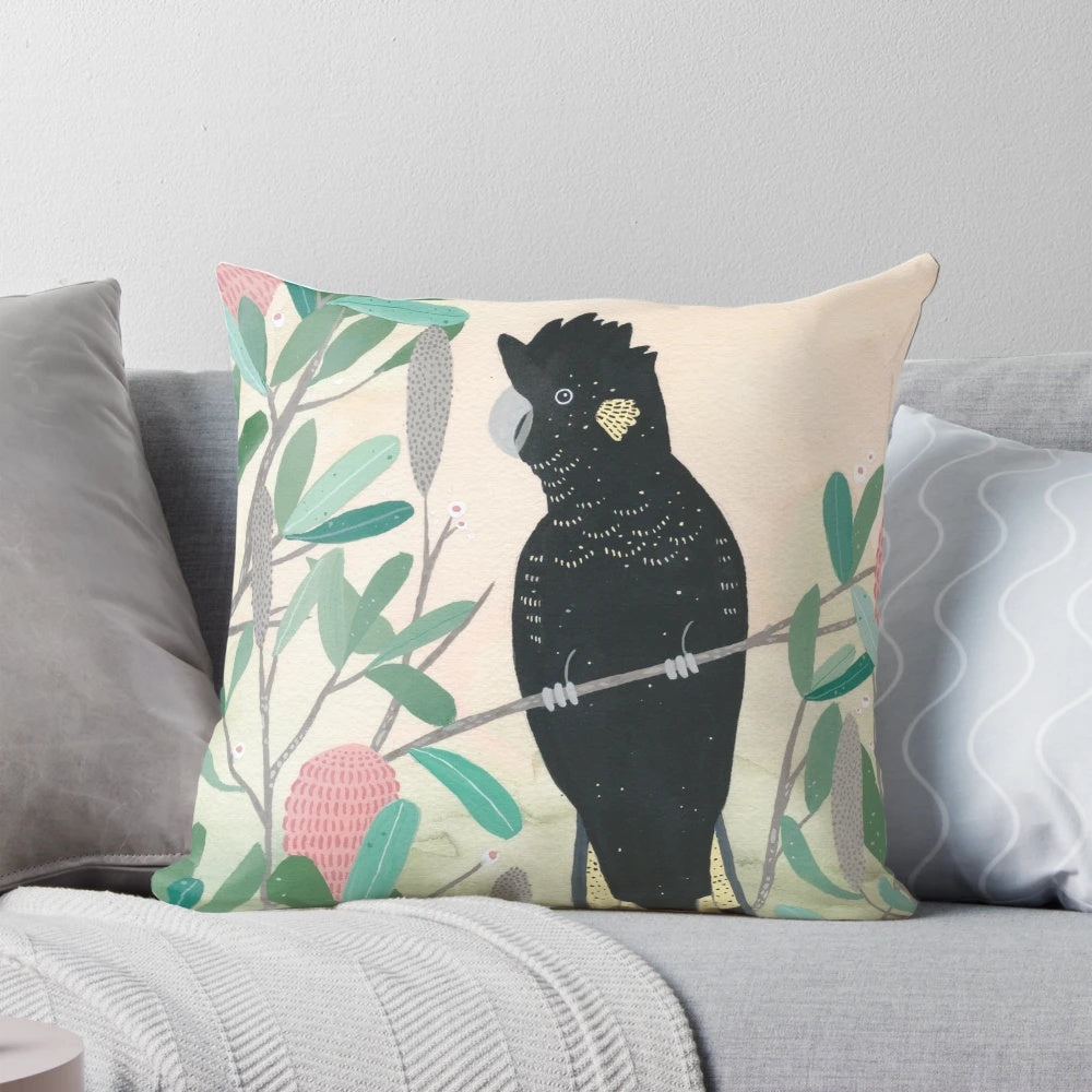 Colorful Australian black cockatoo bird perched on a branch, decorative throw pillow