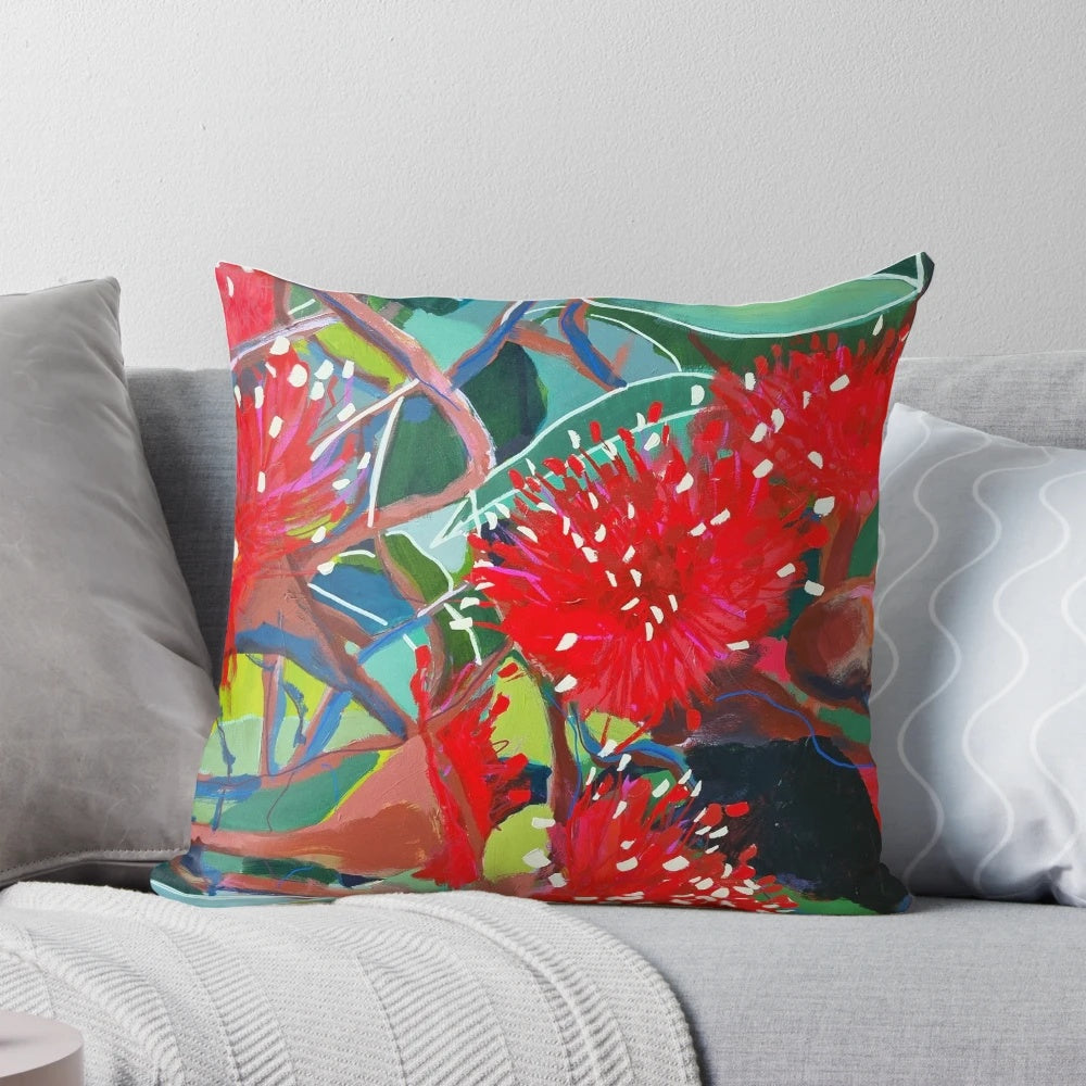 Colorful Australian red gum flowers printed on a soft, high-quality pillow