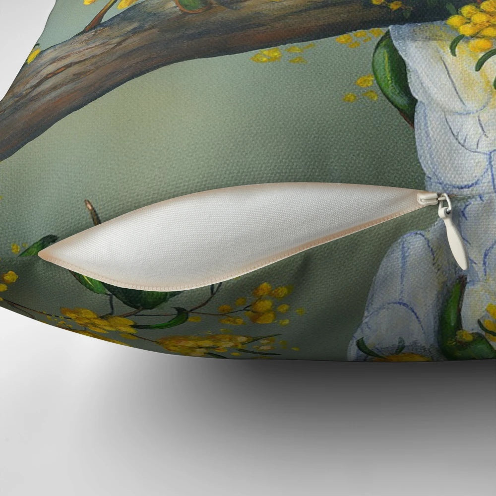 Closeup image of a beautiful Australian white cockatoo perched on a decorative pillow