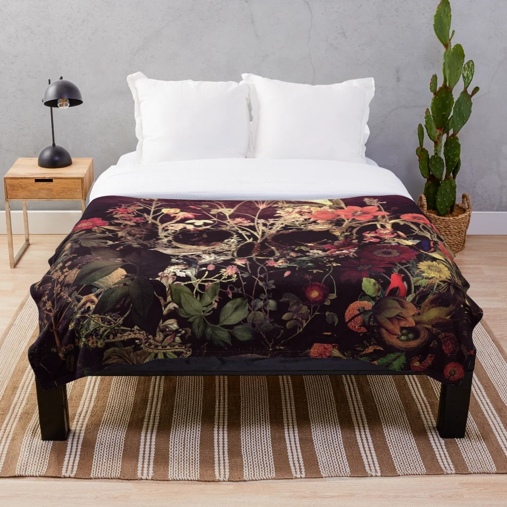 Bloom skull plush blanket featuring a vibrant floral design and sugar skull motif
