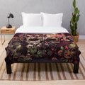 Bloom skull plush blanket featuring a vibrant floral design and sugar skull motif