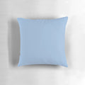 Vibrant Carolina blue pillow with a variety of shades of blue