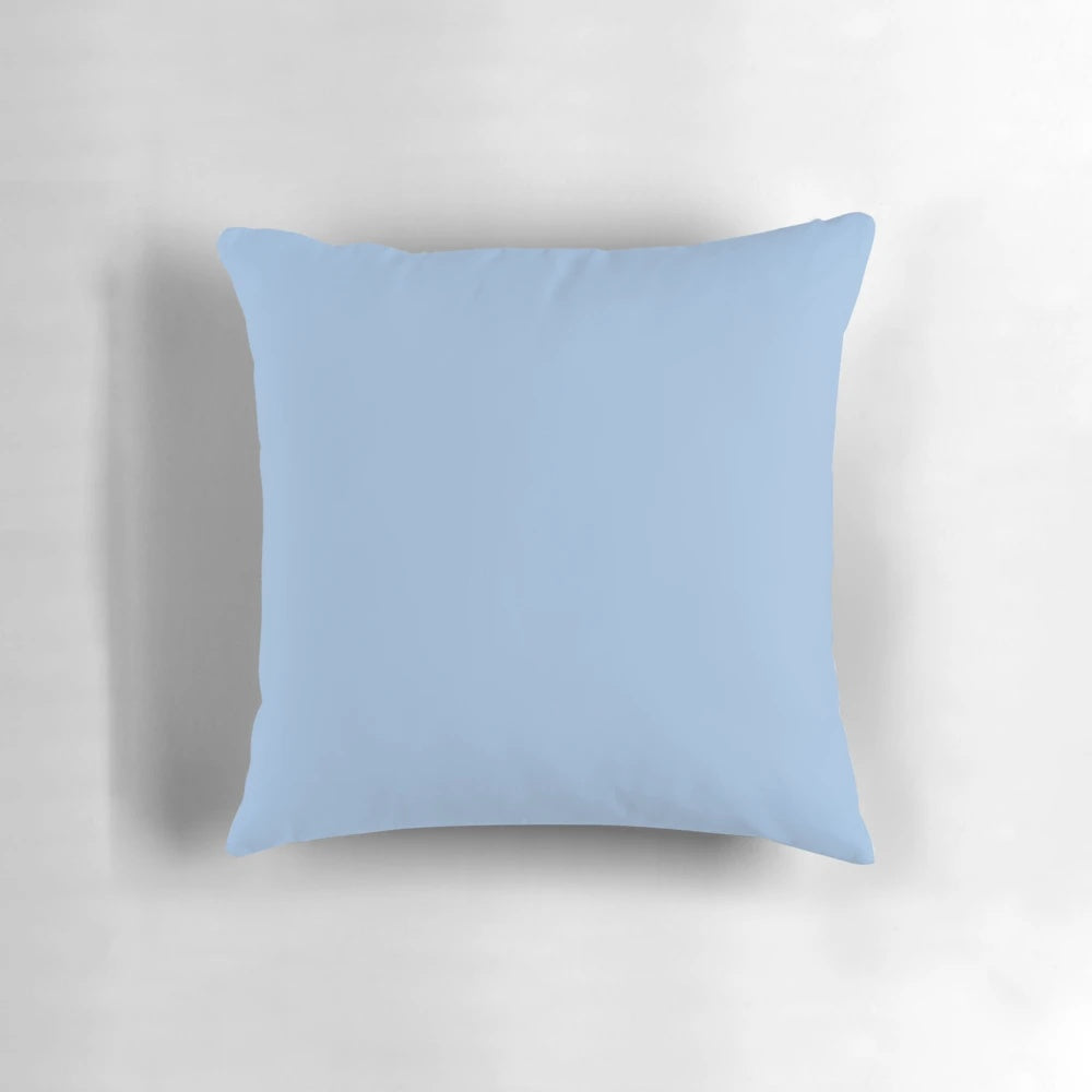 Vibrant Carolina blue pillow with a variety of shades of blue