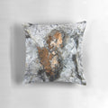 Closeup image of a copper mica pillow, a natural stone with a unique and captivating abstract pattern.