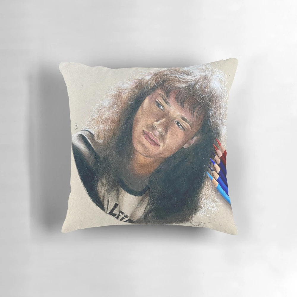 Vibrant colored pencil drawing of Eddie Munson from Stranger Things on a soft, plush pillow
