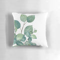 Vibrant watercolor painting of eucalyptus leaves on a soft, plush pillow.