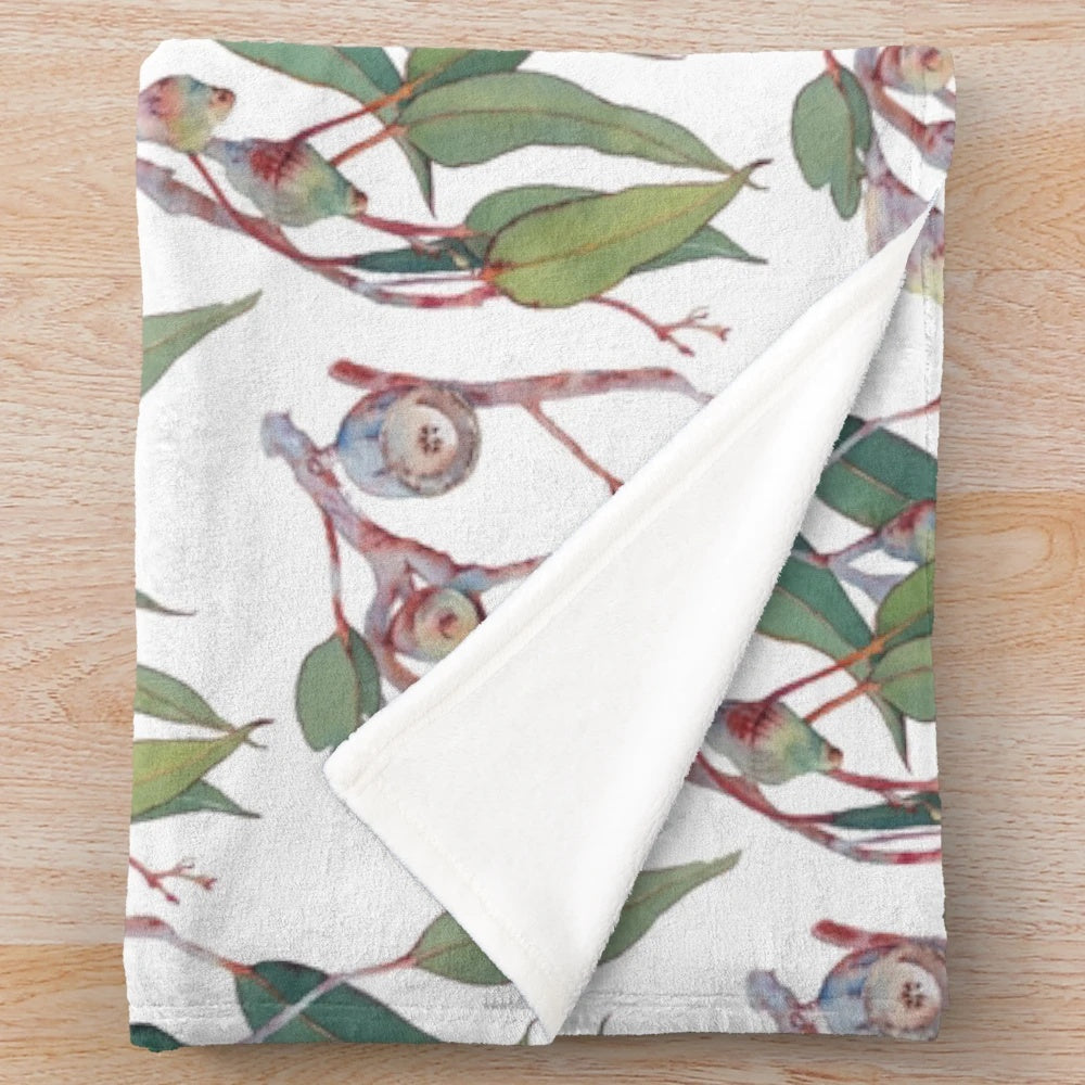 Eucalyptus tree branch watercolor art on a plush blanket