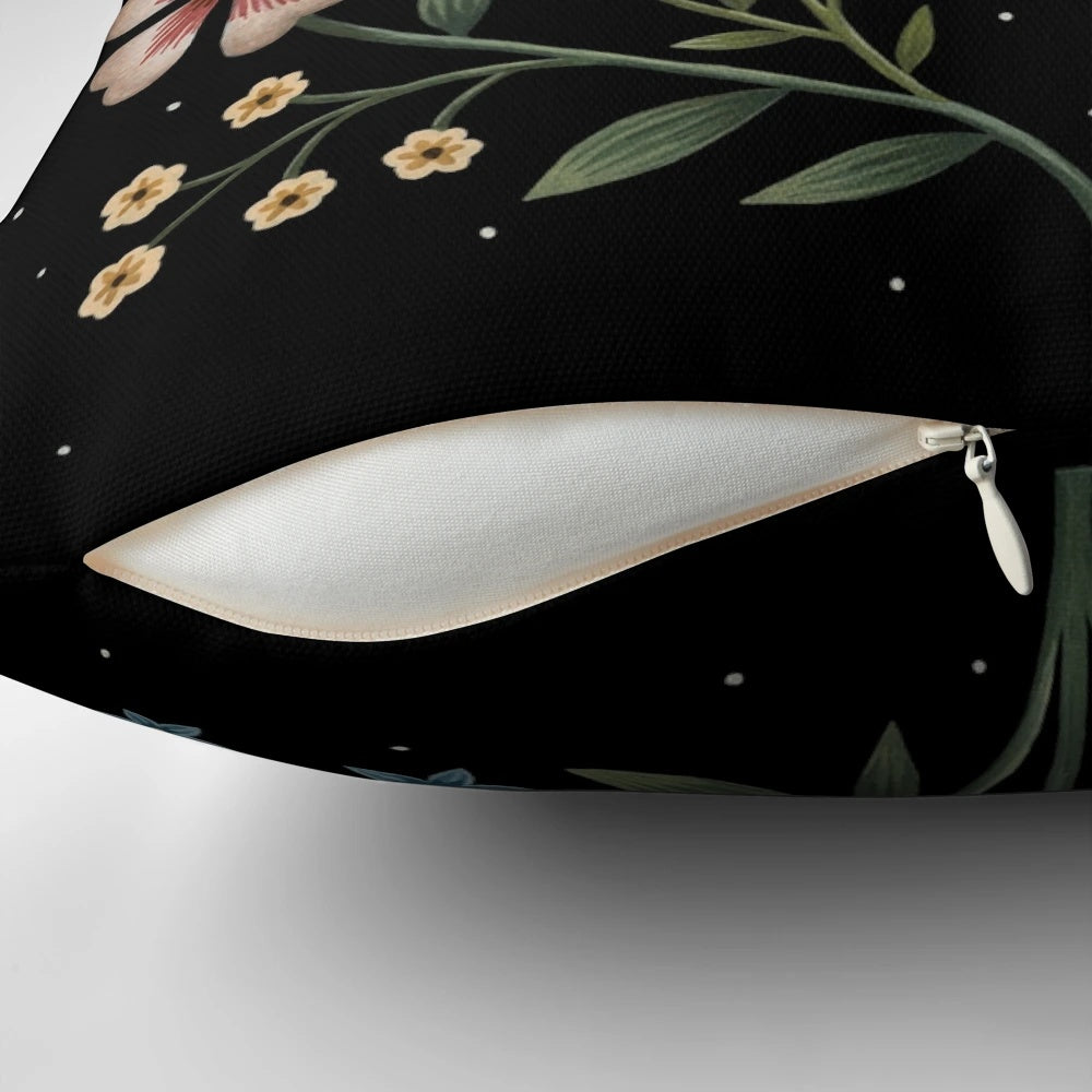 Decorative pillow with a vibrant floral design in a dark, nighttime palette.