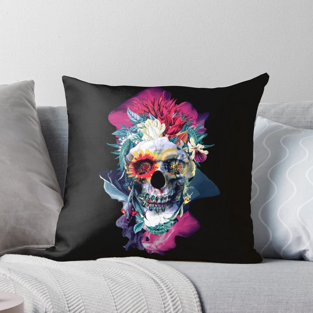 Vibrant floral skull design printed on a blue throw pillow for modern, bohemian interior styling.