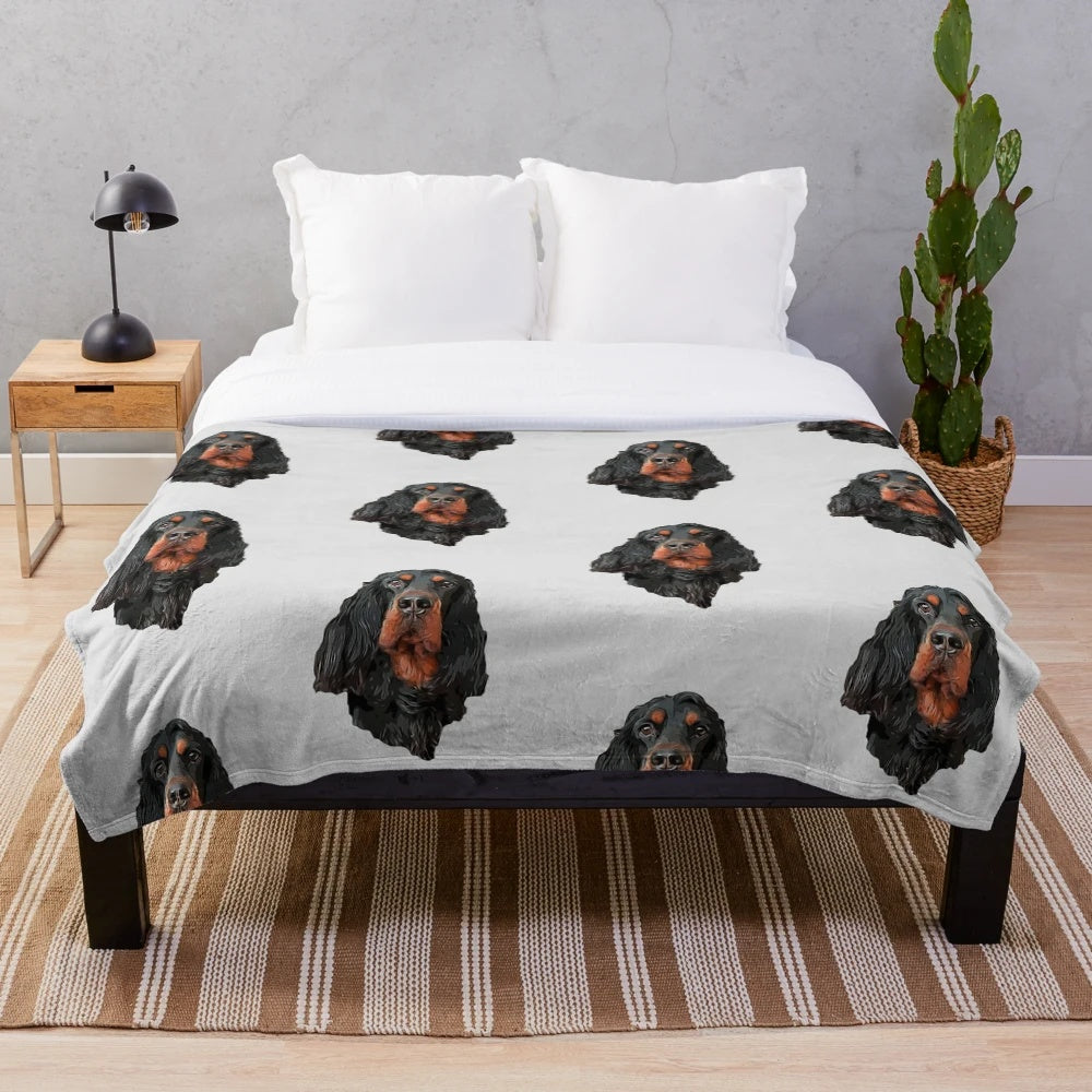 Stunning artistic portrait of a Gordon Setter dog on a plush blanket
