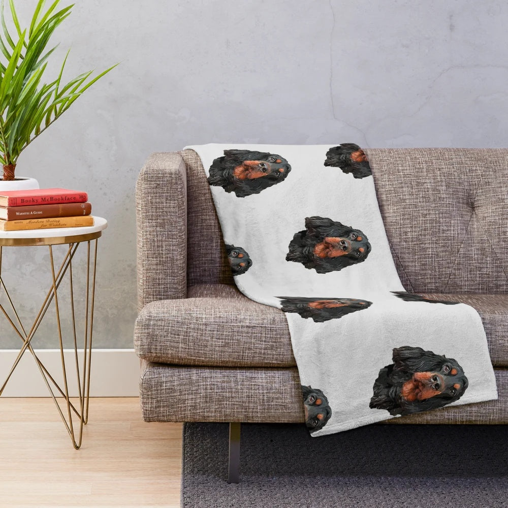 Stunning artistic portrait of a Gordon Setter dog on a plush blanket