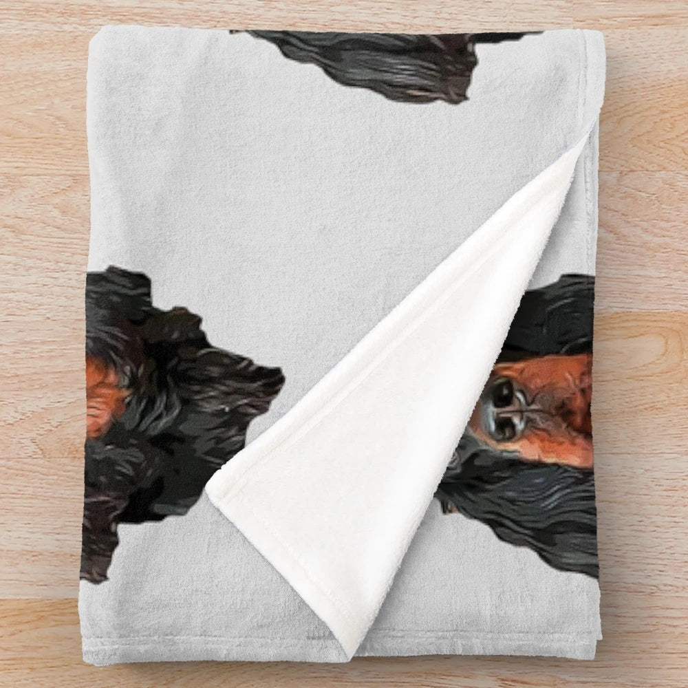 Stunning artistic portrait of a Gordon Setter dog on a plush blanket