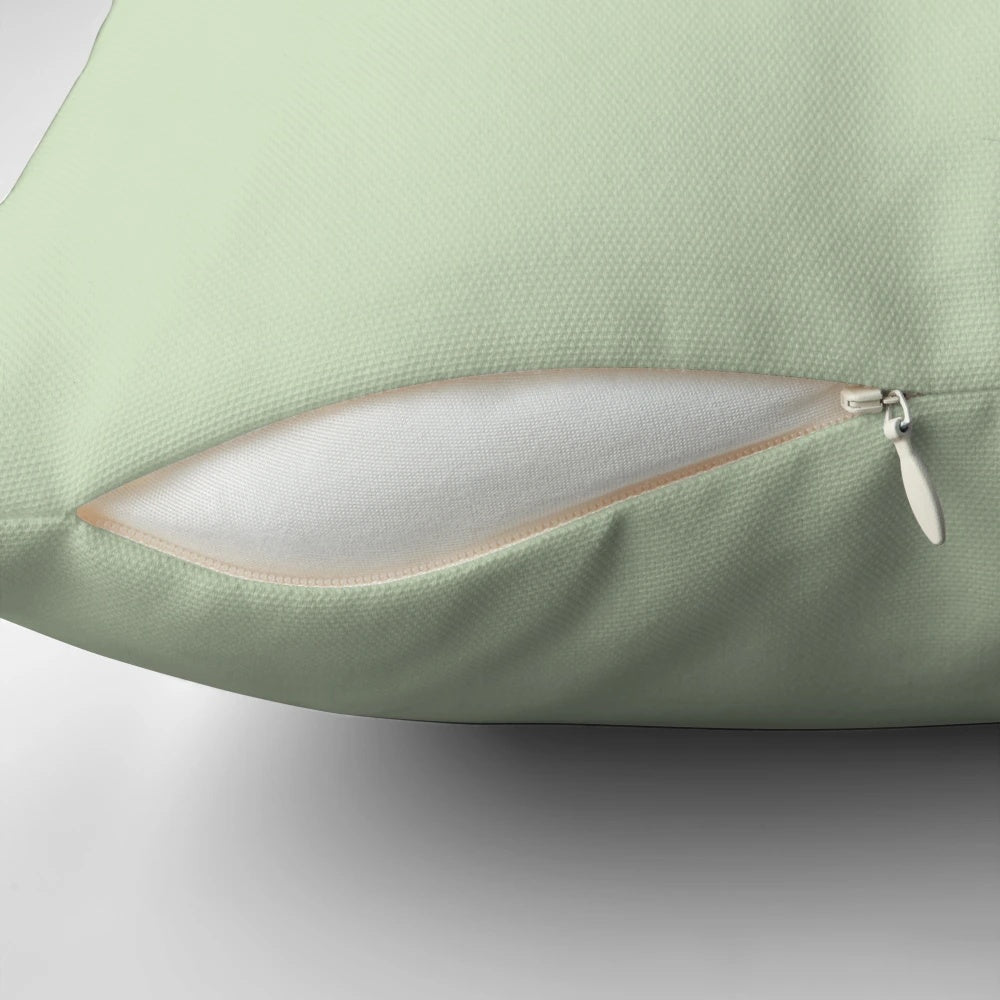Vibrant blue and gray great blue heron bird on a decorative pillow