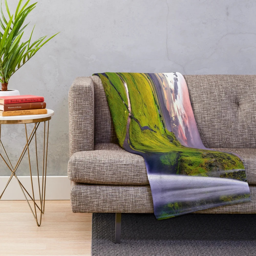 Plush blanket featuring a stunning photograph of the Seljalandsfoss waterfall in Iceland