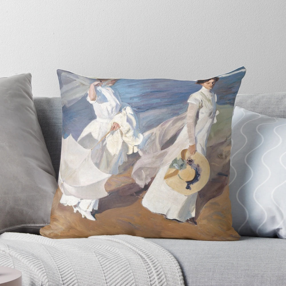 Joaquín Sorolla's vibrant "Strolling along the Seashore" painting printed on a high-quality throw pillow
