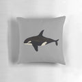 Vibrant watercolor illustration of a killer whale or orca on a soft, plush pillow