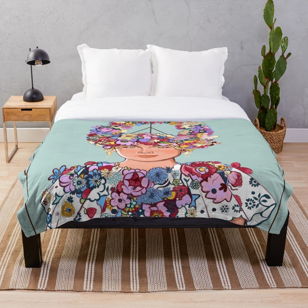 Midsommar-inspired plush blanket featuring floral and aesthetic design
