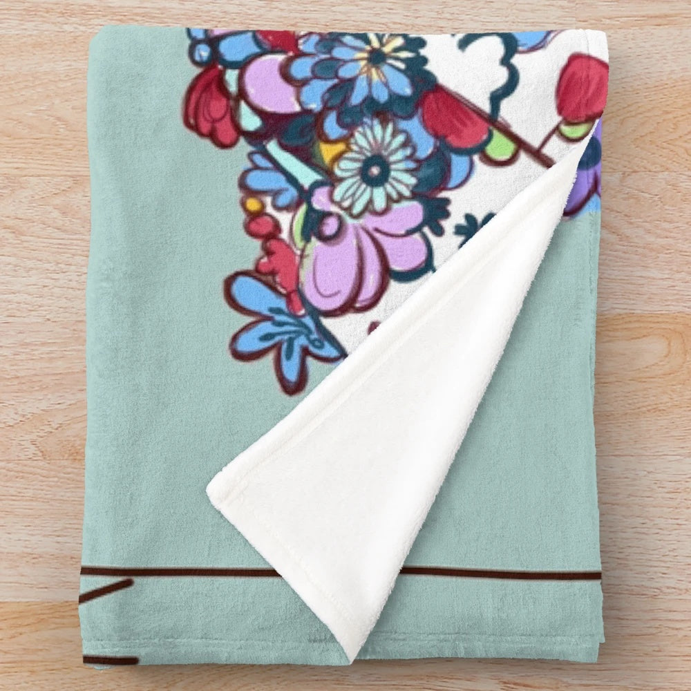 Midsommar-inspired plush blanket featuring floral and aesthetic design
