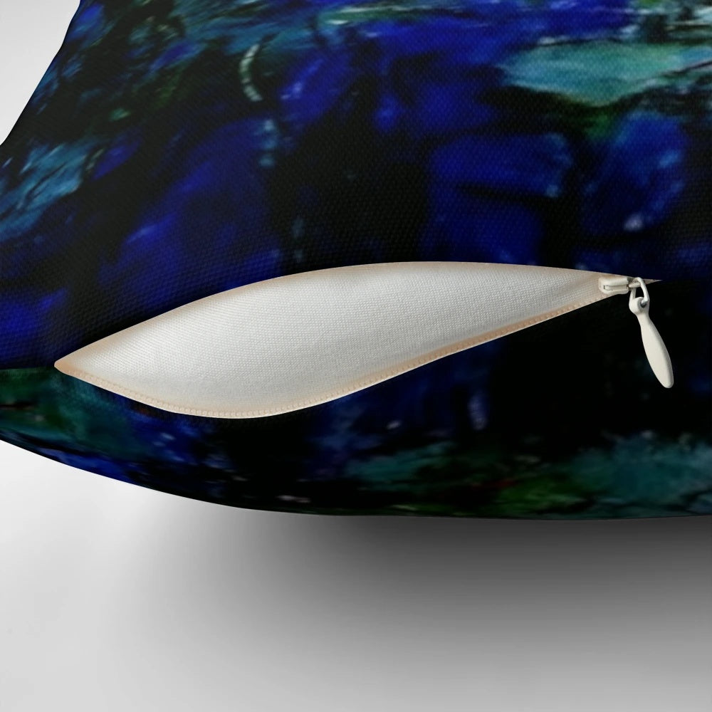 Pillow featuring Claude Monet's iconic blue and white water lily painting, Les Nymphéas Bleus et Blancs