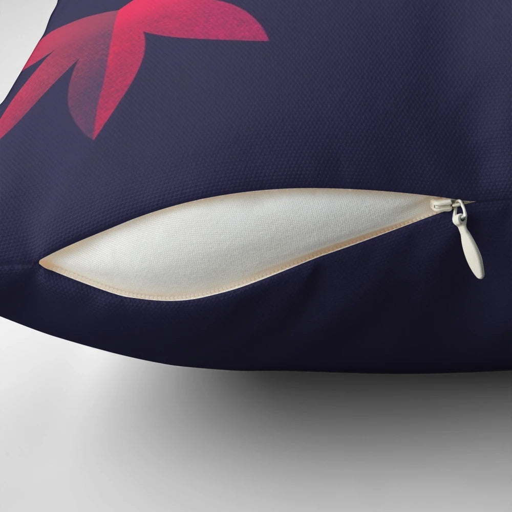 A beautiful pillow featuring a pair of vibrant northern cardinals perched on a Japanese maple tree.