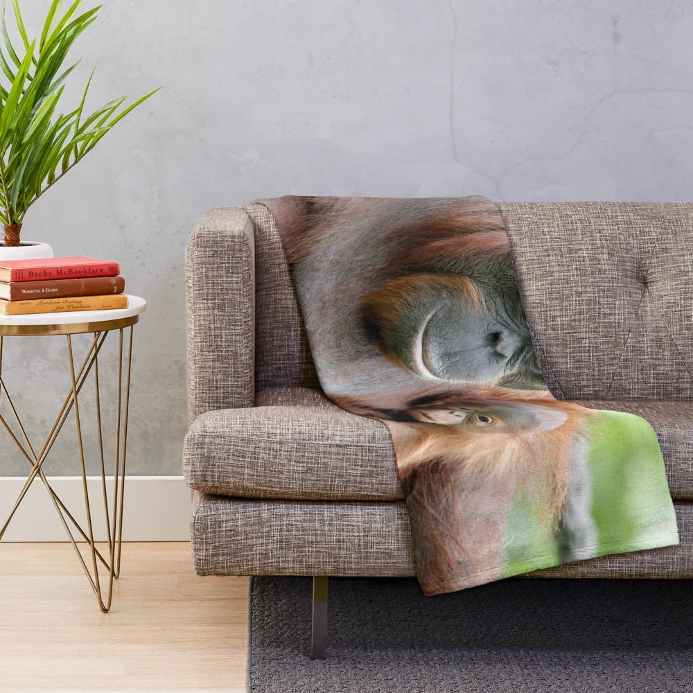 Orang Utan Plush Blanket featuring a captivating portrait of a mother and infant orang utan