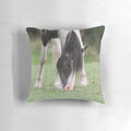 A vibrant, artistic painting of a horse on a plush, decorative pillow.