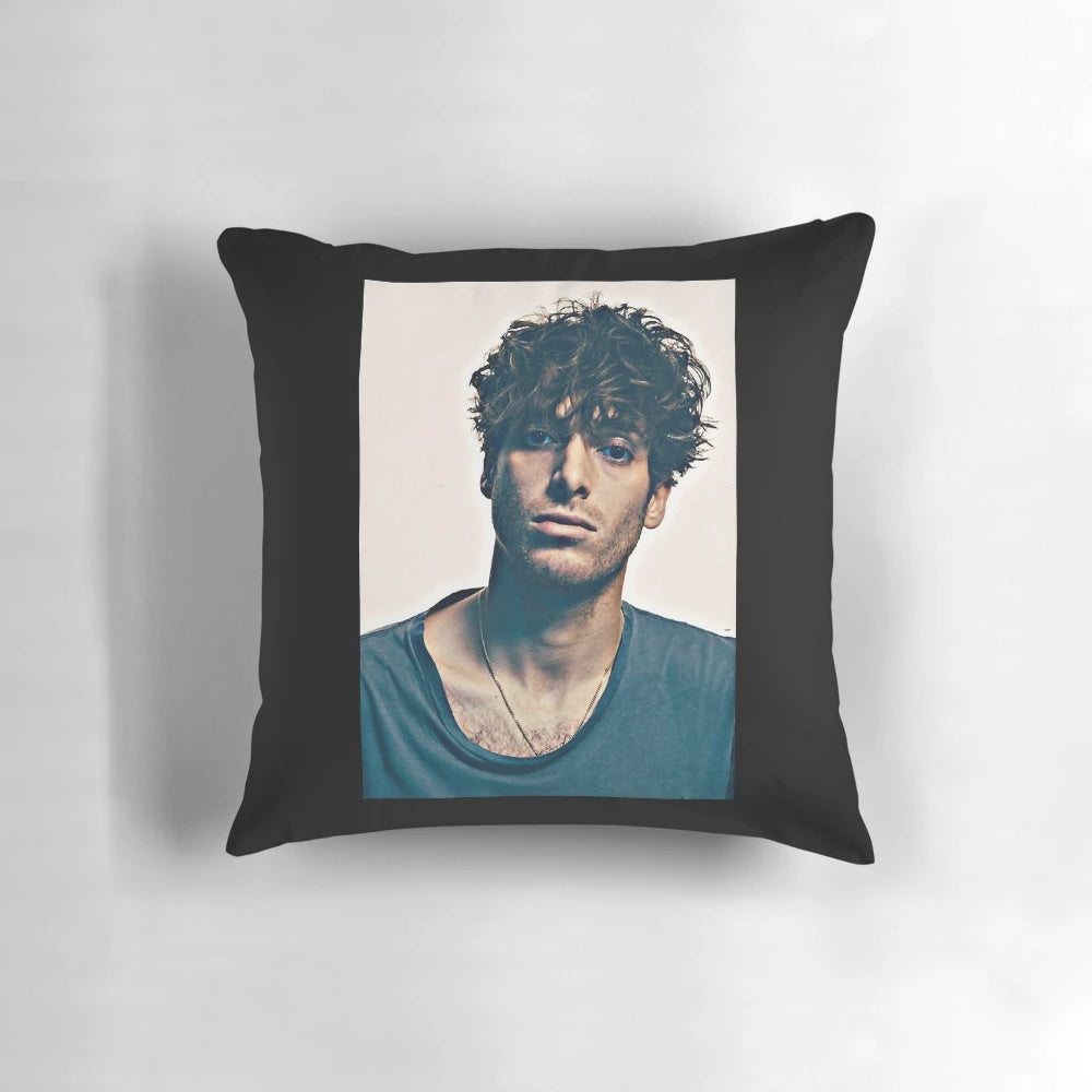 A plush, high-quality pillow featuring the image of renowned Scottish singer-songwriter Paolo Nutini.