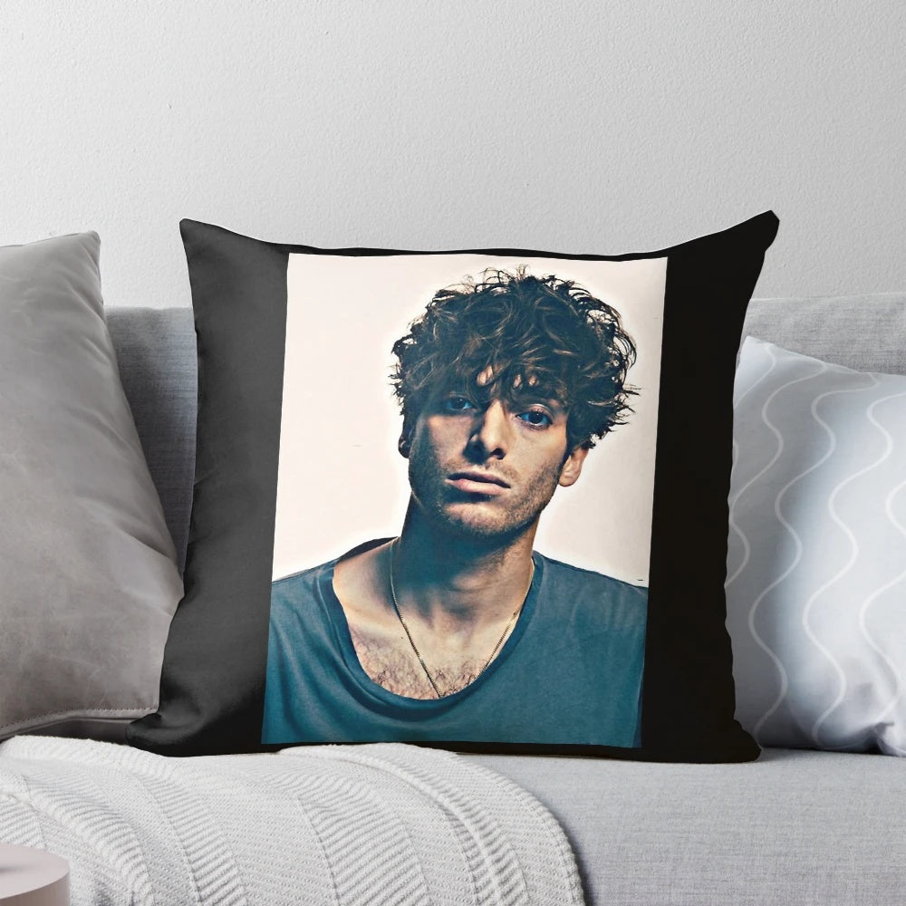 A plush, high-quality pillow featuring the image of renowned Scottish singer-songwriter Paolo Nutini.