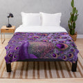 Vibrant purple and gold peacock plush blanket with iridescent feather design